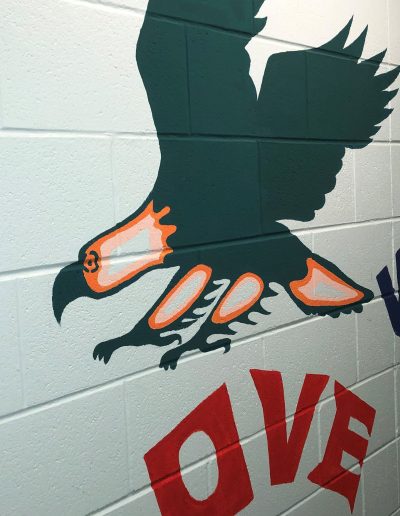 A mural depicting an eagle and the word "love"
