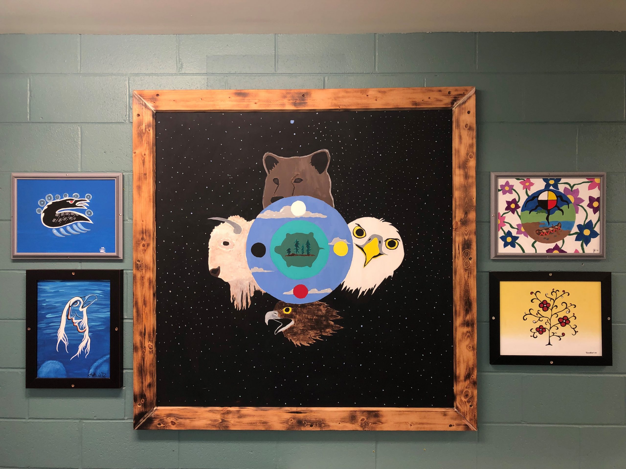 7 A set up of 5 picture frames in the Near North Youth Center