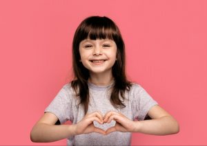 Young girl with heart