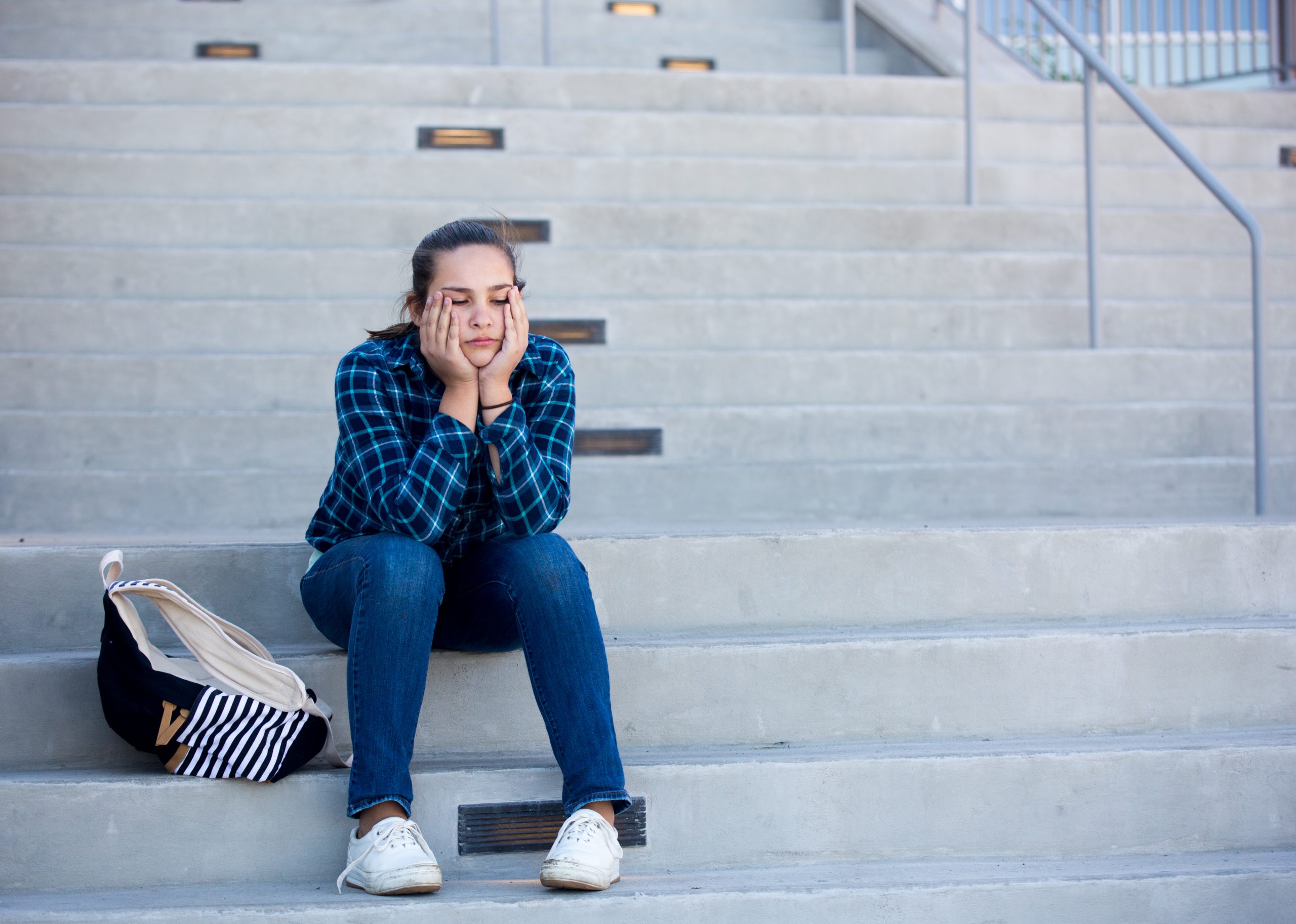Sad girl sitting