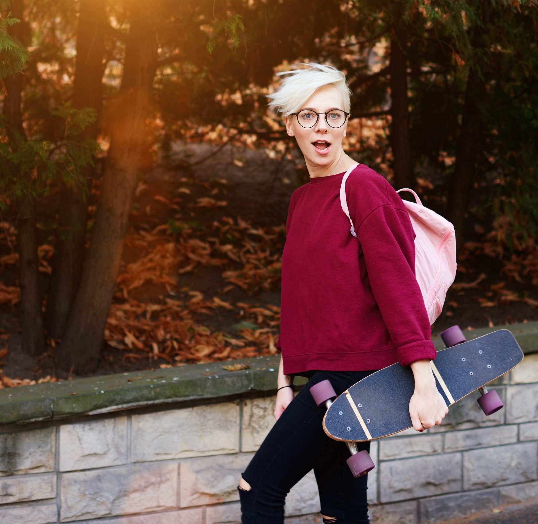 Young woman with a skateboard